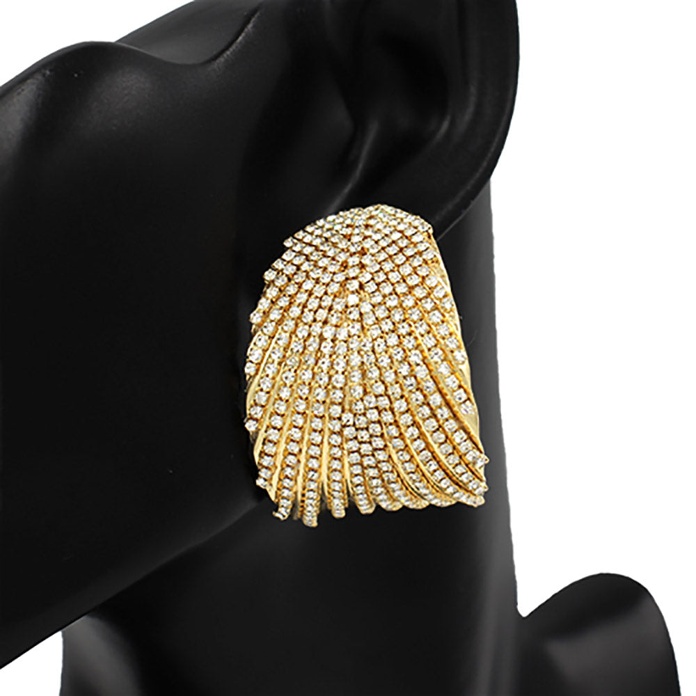 Gold rhinestone leaf-shaped earring on a black mannequin ear