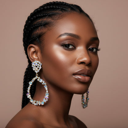 Model wearing Sparkling hoop earring with multicolored gemstones on a blurred background