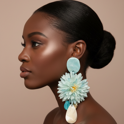 Woman wearing large floral earrings on a beige background